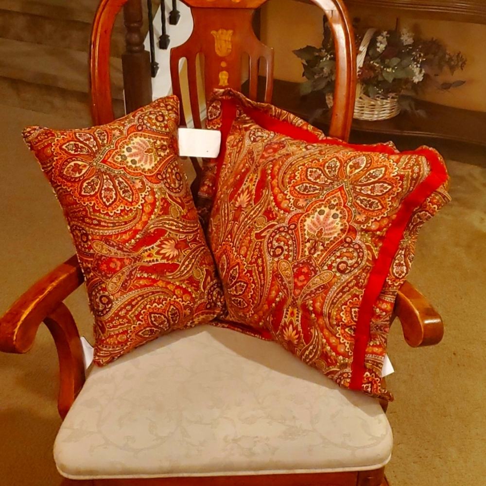 2 Raymond Waites Throw Pillows